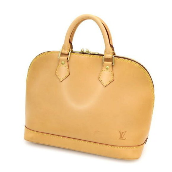 Louis Vuitton natural tanned leather Nomad Alma - Picture 1 of 9